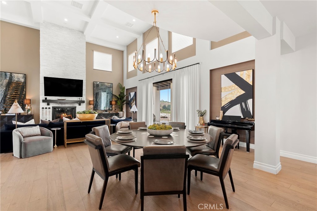 27716 Sycamore Mesa Road Temecula, CA 92590 - Photo 20 of 73 a view of a dining room with furniture window and wooden floor