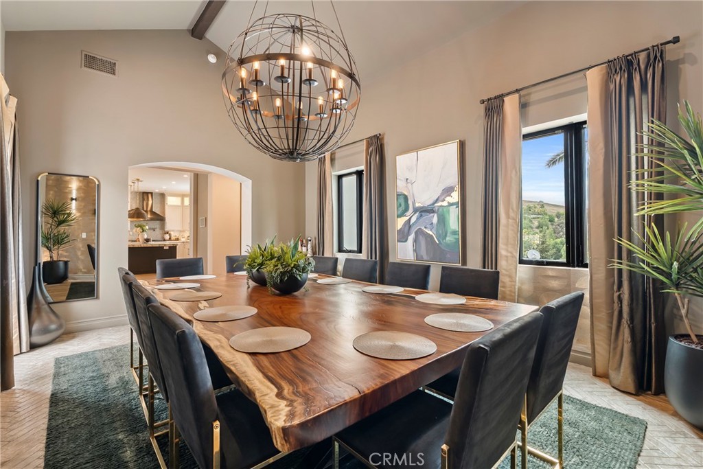 27716 Sycamore Mesa Road Temecula, CA 92590 - Photo 26 of 73 a view of a dining room with furniture window and wooden floor