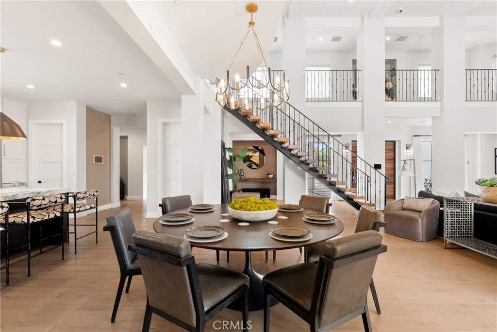 27716 Sycamore Mesa Road Temecula, CA 92590 - Photo 29 of 73 a view of a dining room with furniture and wooden floor