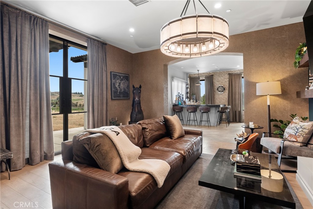 27716 Sycamore Mesa Road Temecula, CA 92590 - Photo 33 of 73 a living room with furniture and a large window