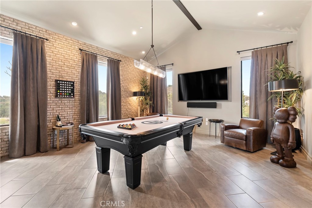 27716 Sycamore Mesa Road Temecula, CA 92590 - Photo 36 of 73 a room with furniture pool table flat screen tv and windows
