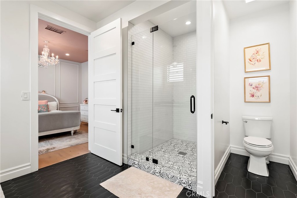 27716 Sycamore Mesa Road Temecula, CA 92590 - Photo 56 of 73 a bathroom with a sink a toilet and shower