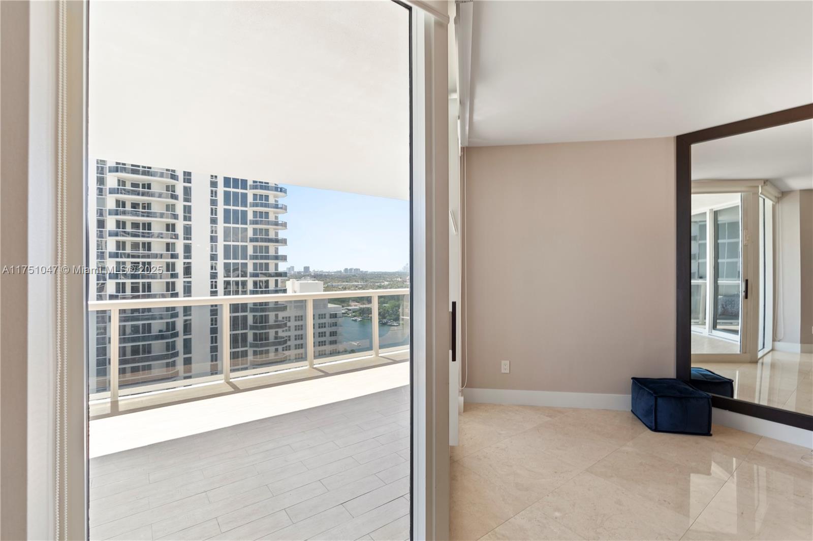 4779 Collins Avenue, Unit 2204 Miami Beach, FL 33140 - Photo 12 of 58 a view of an empty room with a window