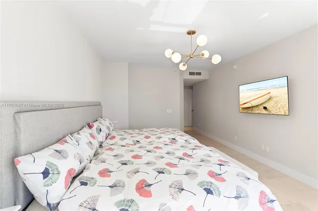 a bathroom with a bathtub and a vanity