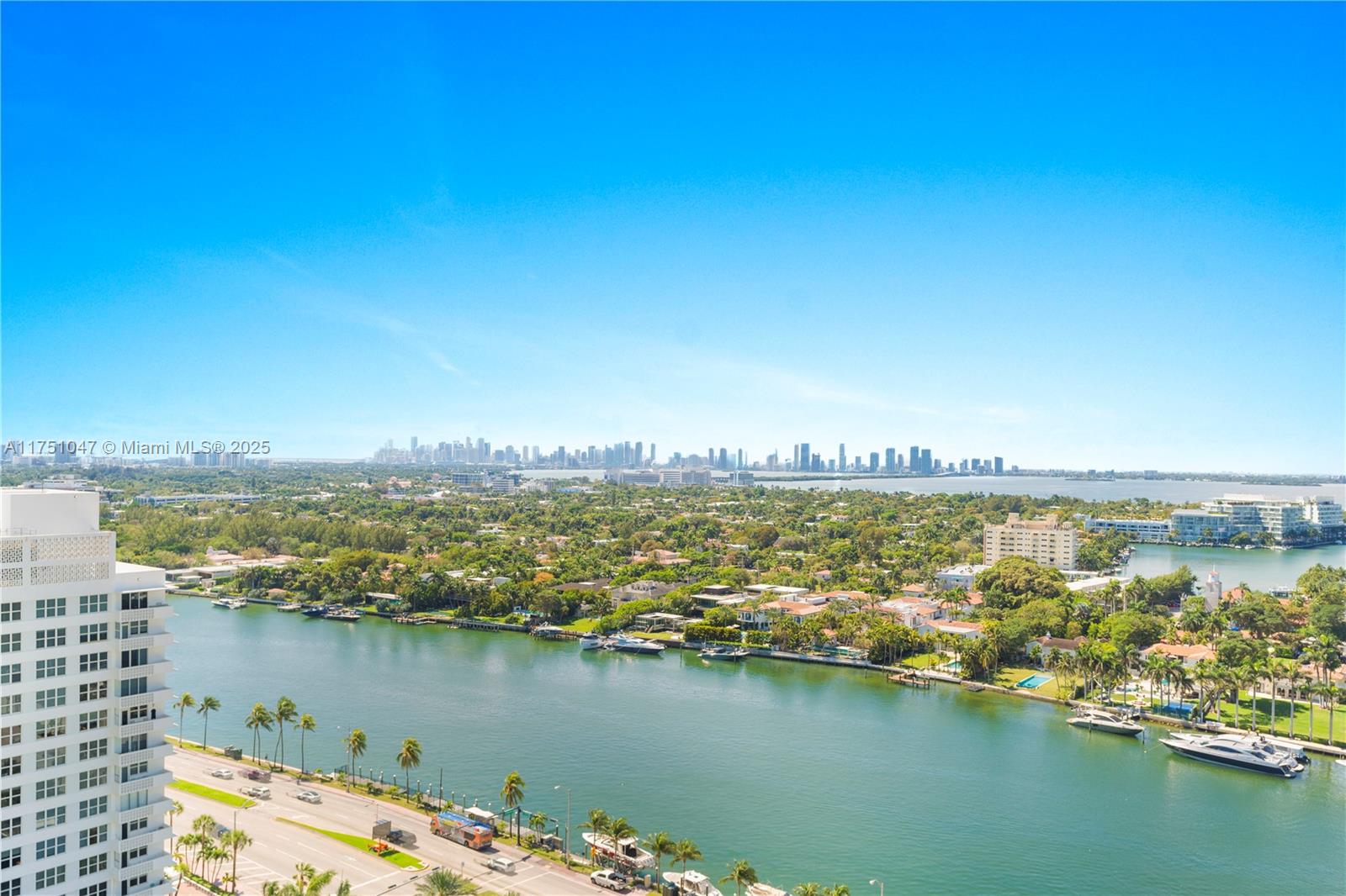 4779 Collins Avenue, Unit 2204 Miami Beach, FL 33140 - Photo 3 of 58 an aerial view of ocean and residential houses with outdoor space