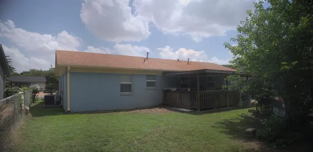 a view of house with backyard and entertaining space