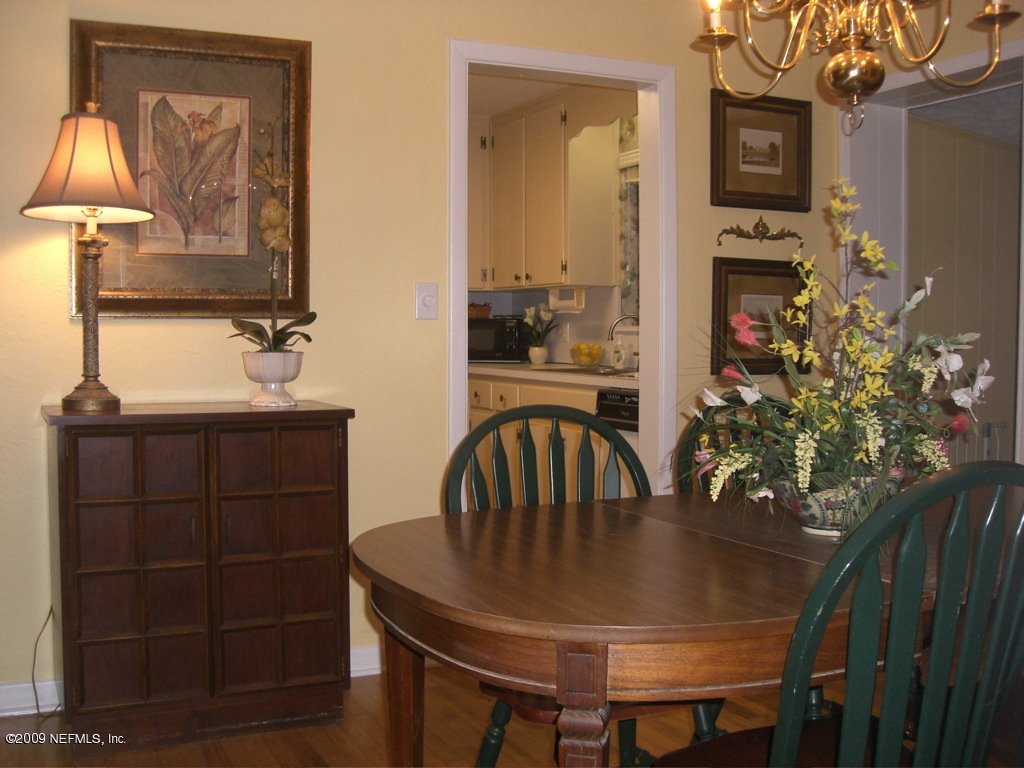 6830 Sans Souci Road Jacksonville, FL 32216 - Photo 9 of 18 Dining Room leading to kitchen