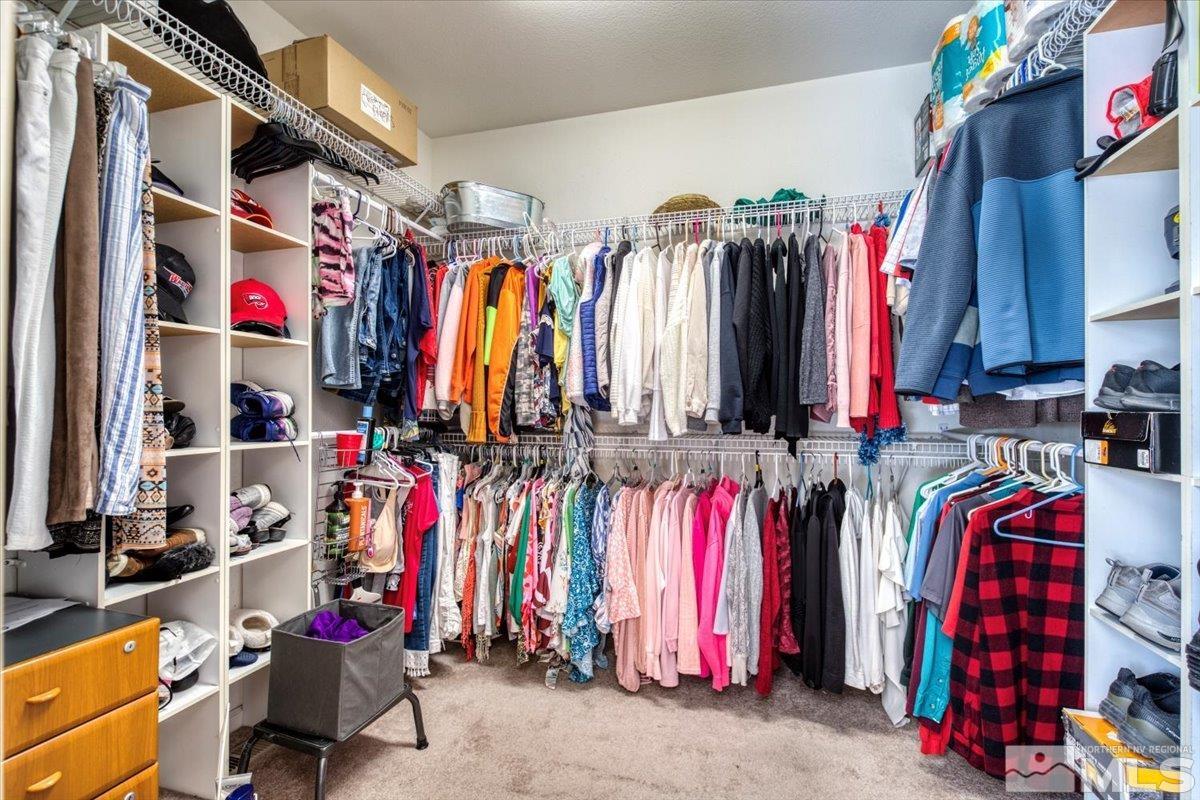 5670 Falcon Ridge Court Sparks, NV 89436 - Photo 23 of 40 a view of walk in closet with clothes