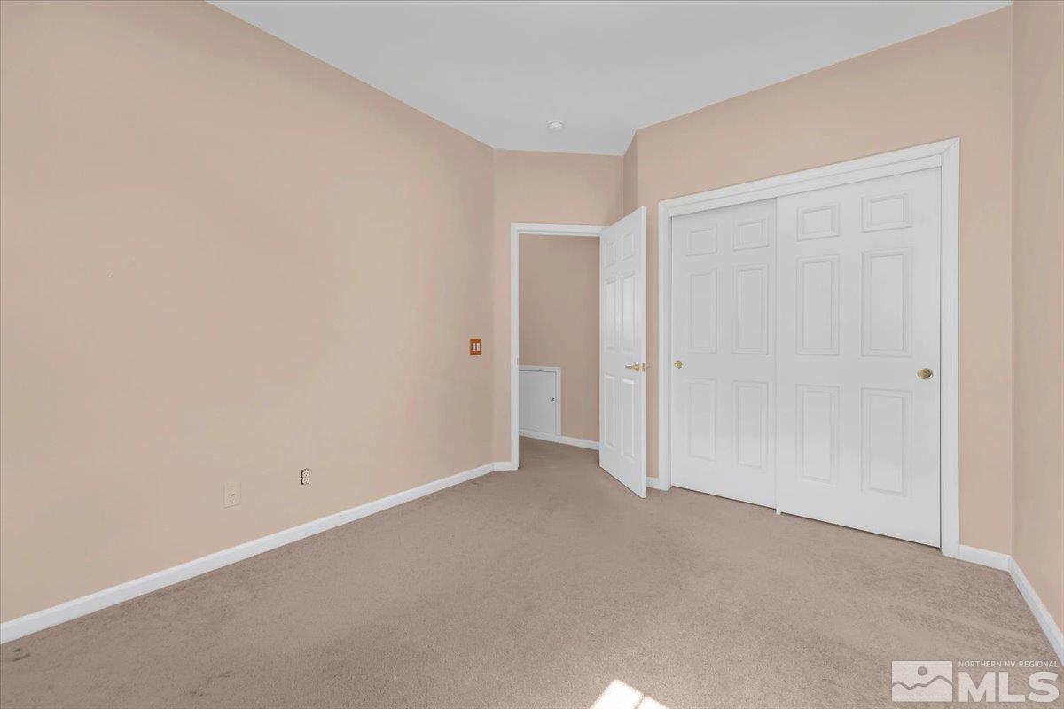 5670 Falcon Ridge Court Sparks, NV 89436 - Photo 29 of 40 an empty room with an entryway