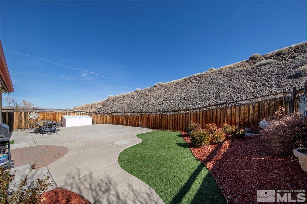5670 Falcon Ridge Court Sparks, NV 89436 - Photo 39 of 40 a view of a backyard of the house