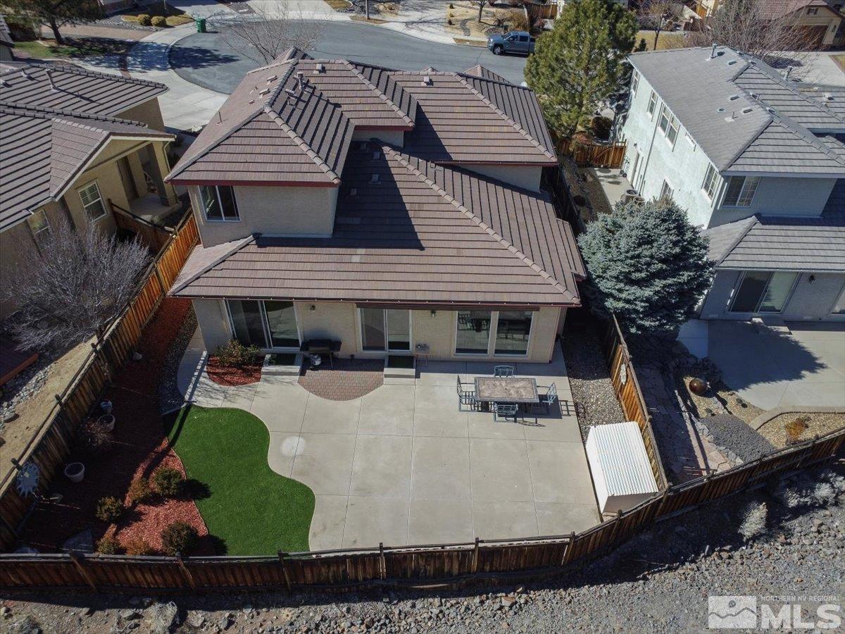 5670 Falcon Ridge Court Sparks, NV 89436 - Photo 40 of 40 a view of a house with backyard and sitting area