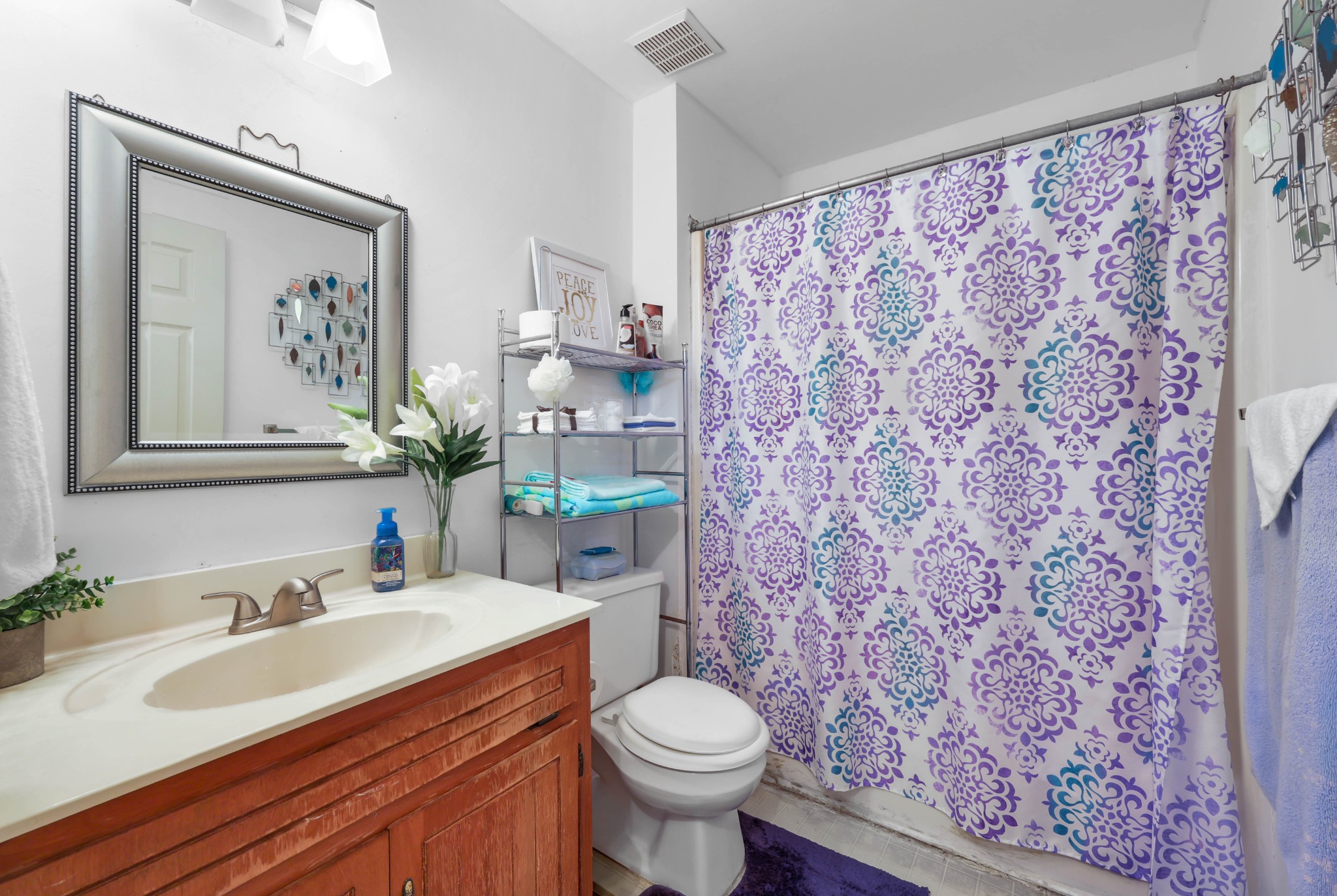 3702 Trenton Road Clarksville, TN 37042 - Photo 16 of 26 a bathroom with a granite countertop sink and a toilet