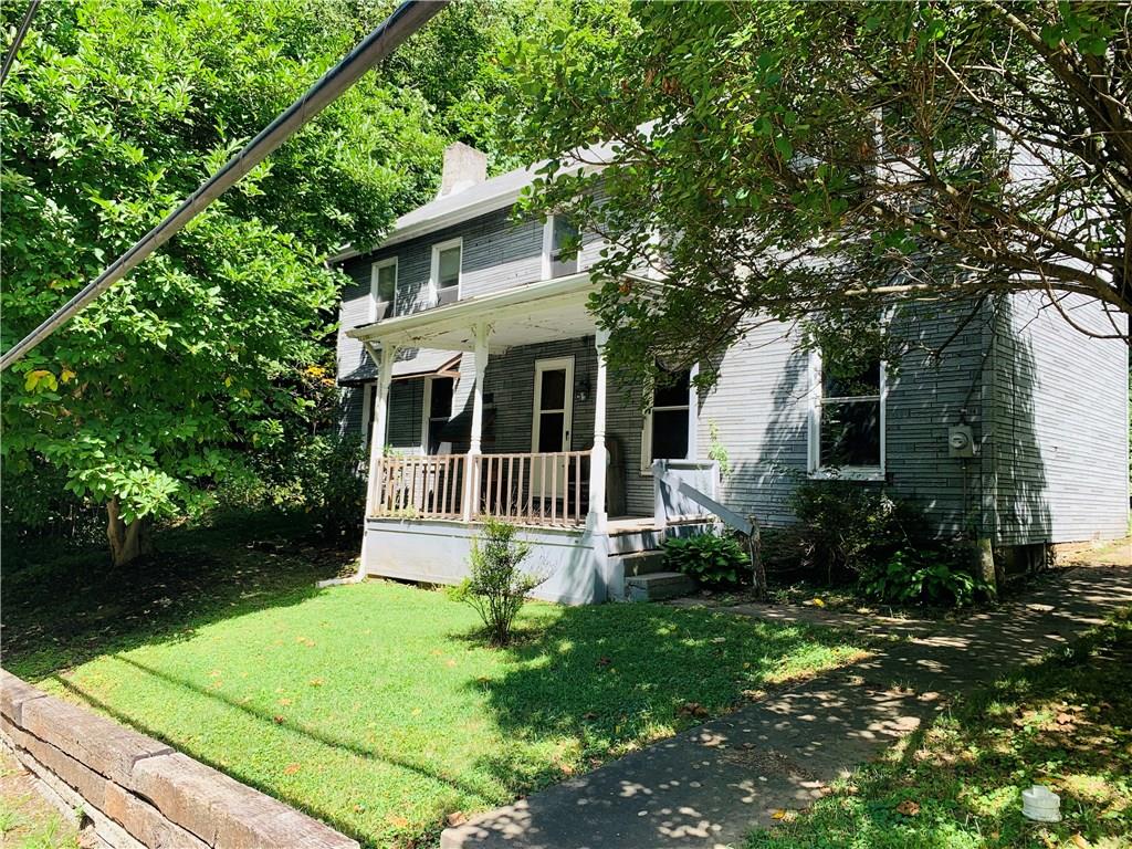 3 bedroom farmhouse on 1.25 acres with public water and sewage.  Being sold in as-is condition.  Cash or rehab mortgage only