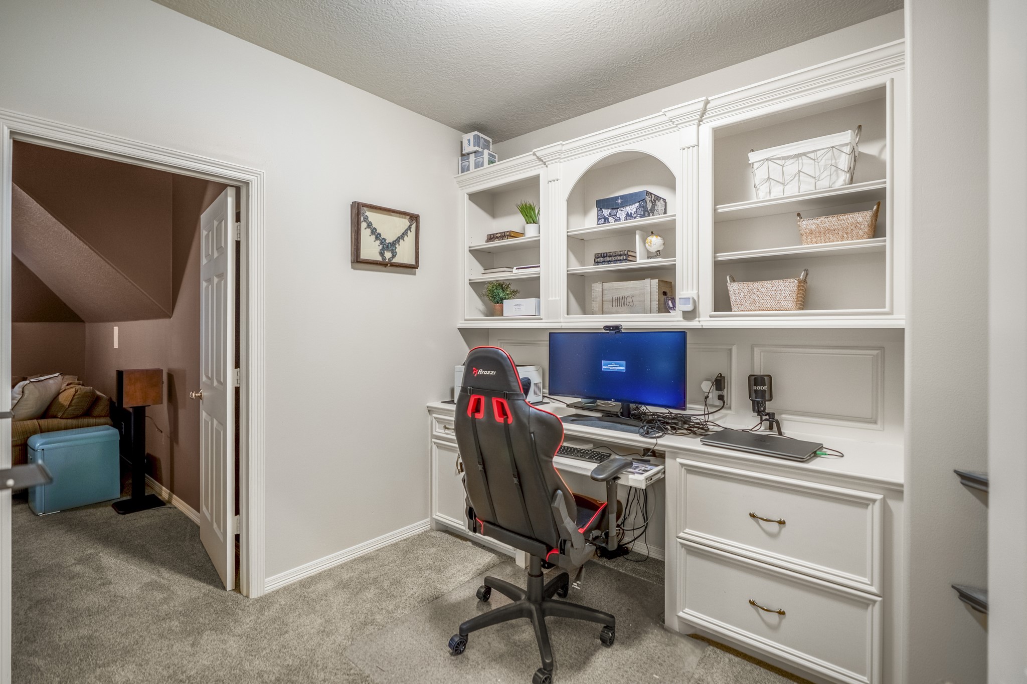 8806 Sterling Gate Circle Spring, TX 77379 - Photo 25 of 40 On the second floor of the home at the top of the stairs is this second office or study nook. Through the door on the left is the media room.