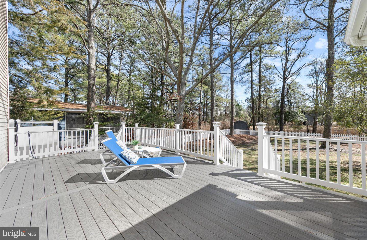 21 Cedar Road Rehoboth Beach, DE 19971 - Photo 18 of 59 a view of a chair and tables on the roof deck