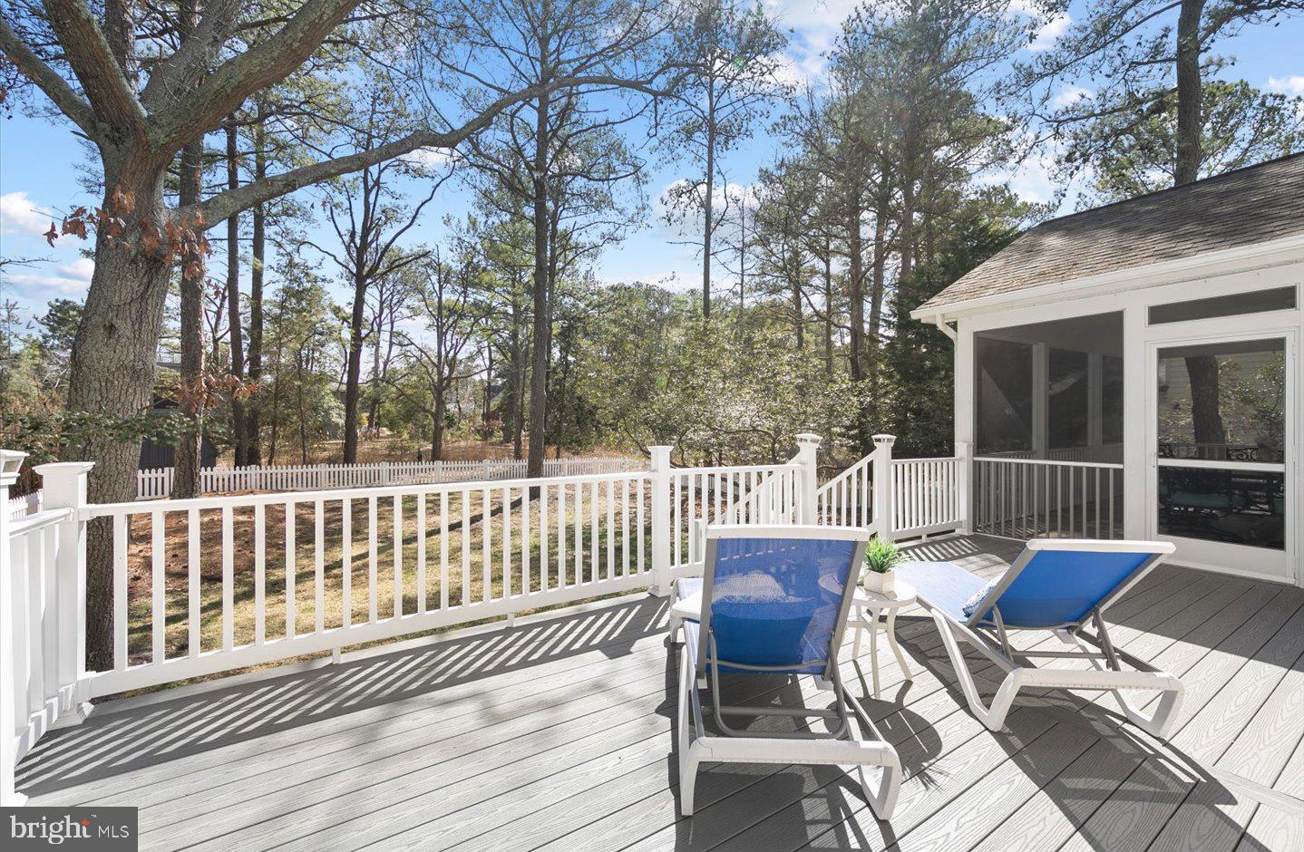 21 Cedar Road Rehoboth Beach, DE 19971 - Photo 19 of 59 a view of a chair and tables