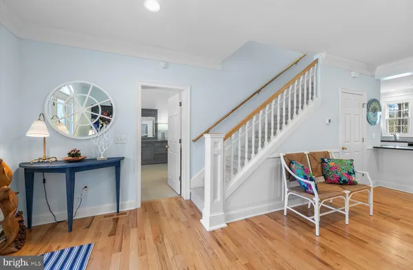 a bedroom with two beds and a couch