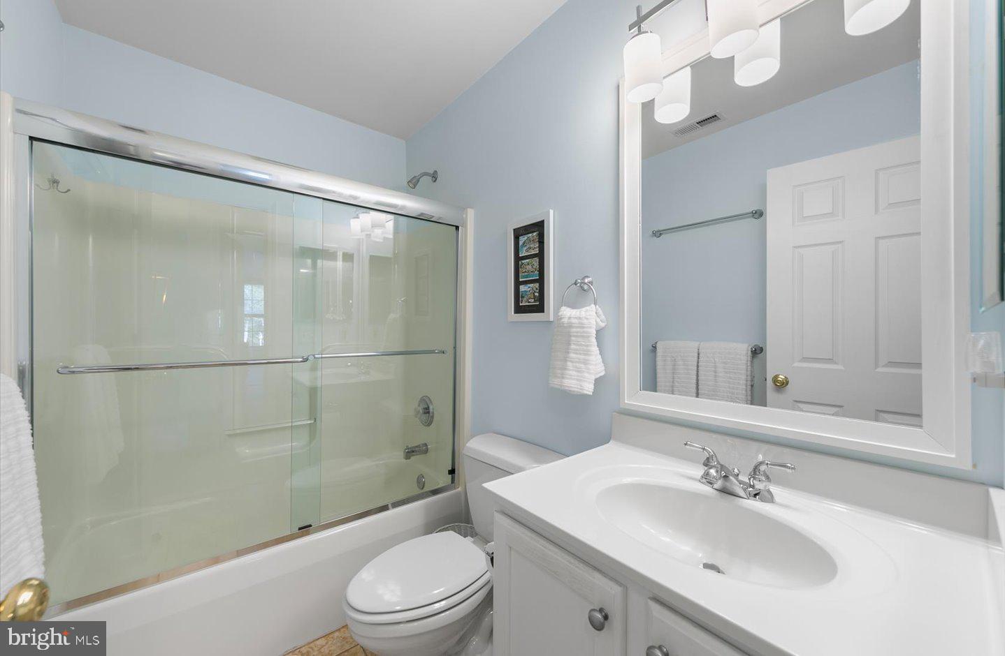 21 Cedar Road Rehoboth Beach, DE 19971 - Photo 36 of 59 a bathroom with a sink a toilet and shower