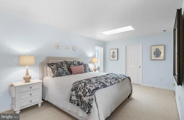 a bedroom with furniture and a couch