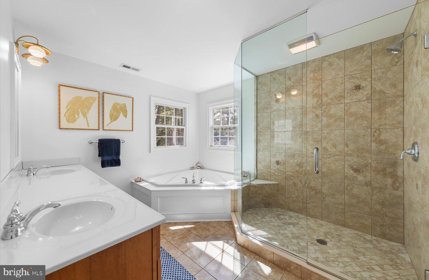 21 Cedar Road Rehoboth Beach, DE 19971 - Photo 43 of 59 a bathroom with a sink a toilet and shower