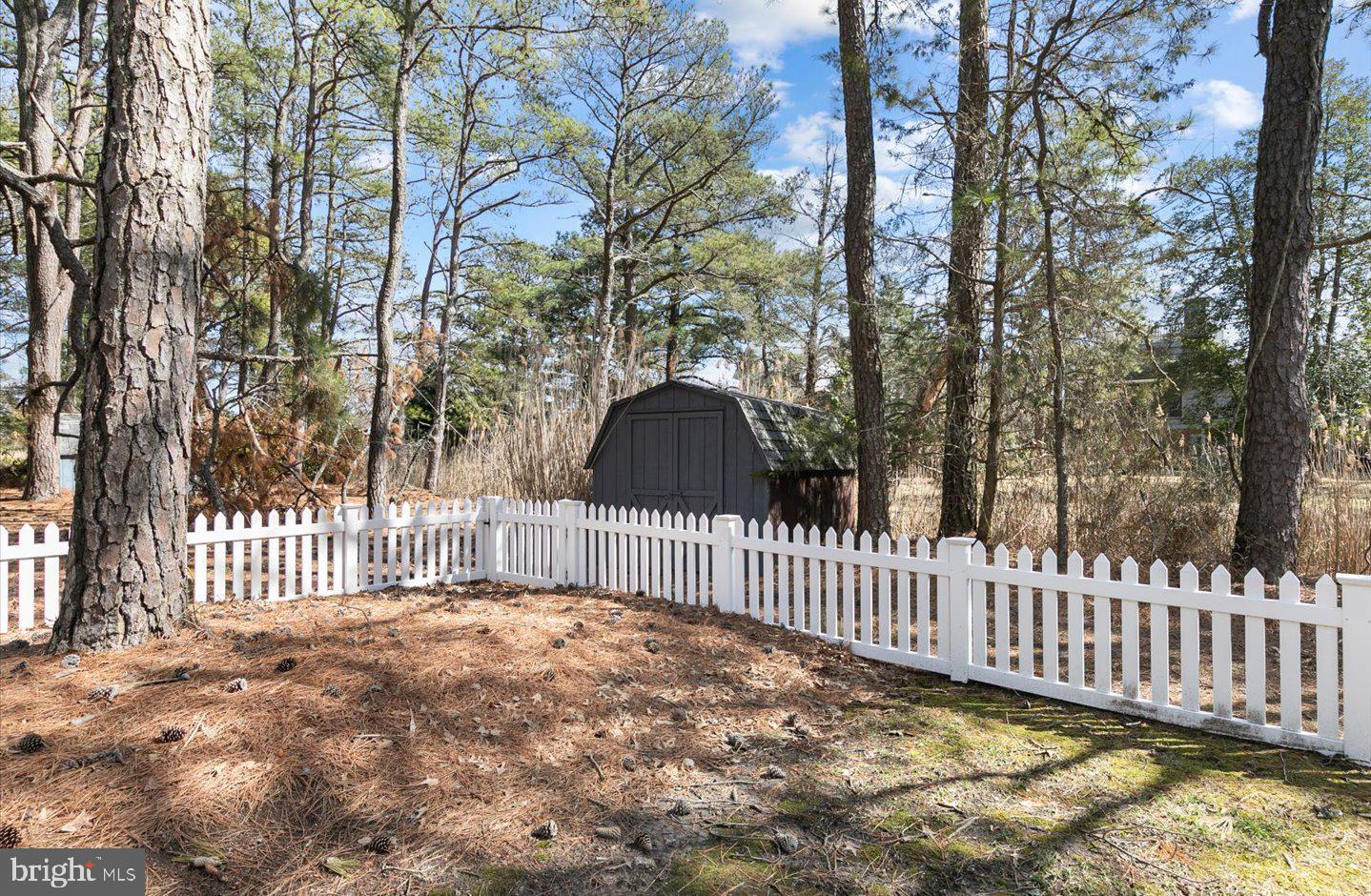 21 Cedar Road Rehoboth Beach, DE 19971 - Photo 50 of 59 a view of a gate with a fence