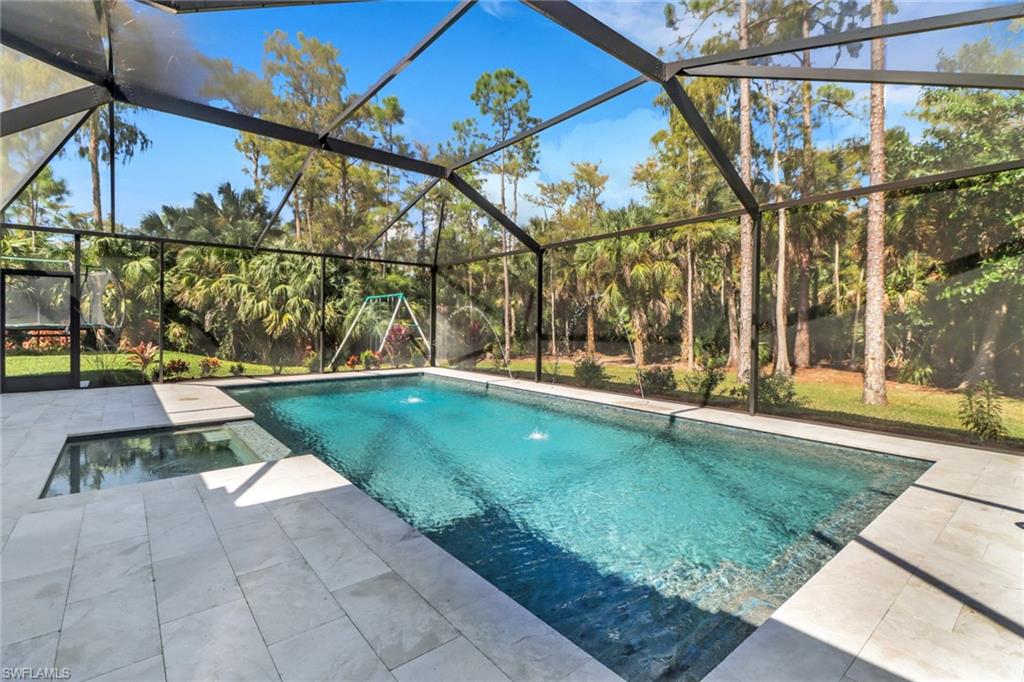 421 35th Avenue Northeast Naples, FL 34120 - Photo 16 of 39 a view of swimming pool