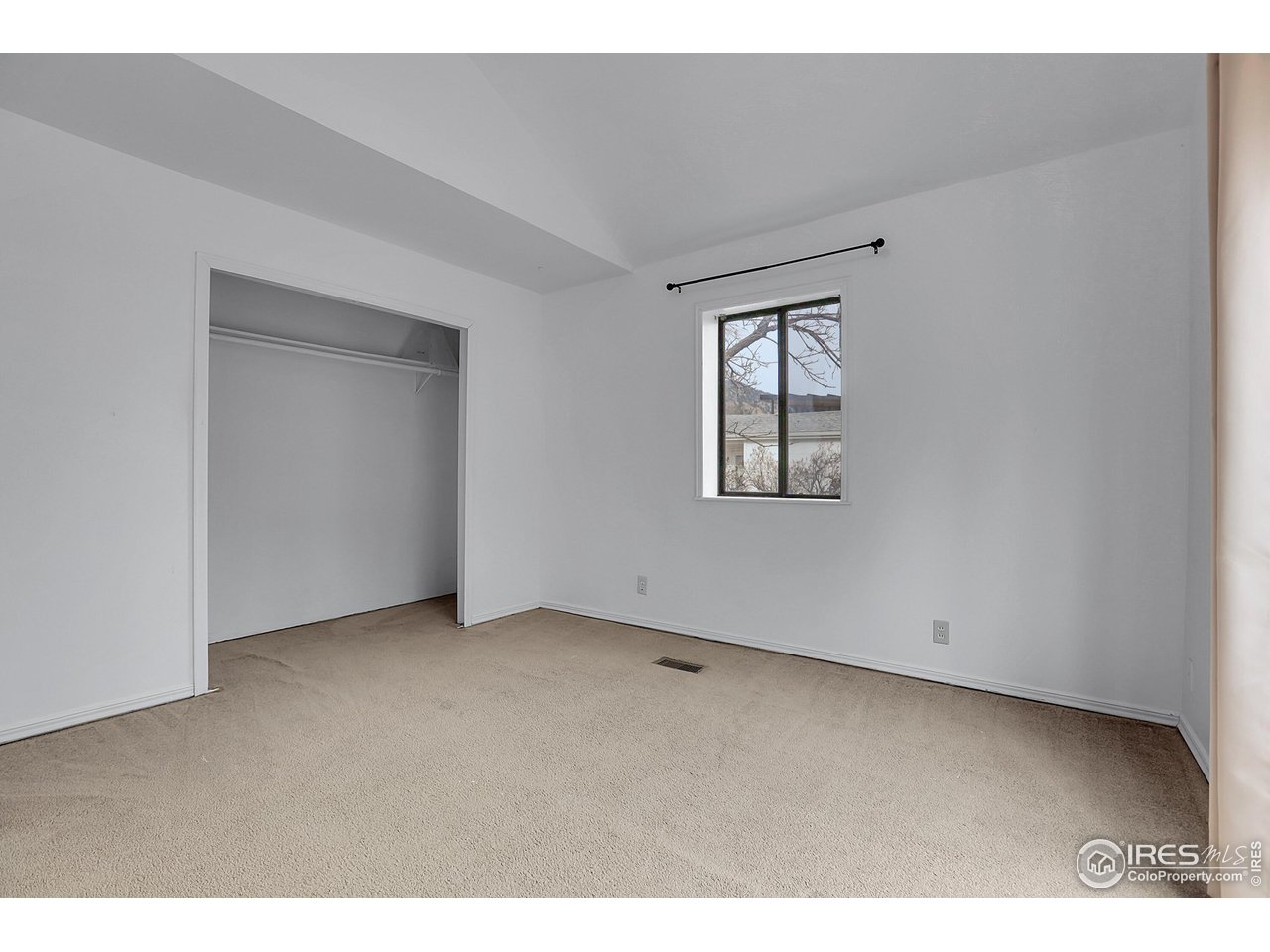 1628 4th Street Boulder, CO 80302 - Photo 12 of 27 an empty room with windows and closet
