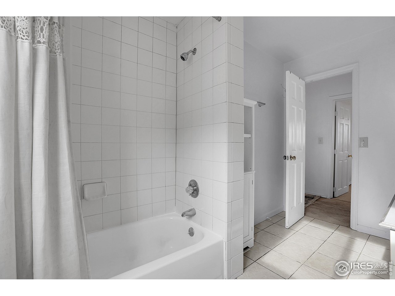 1628 4th Street Boulder, CO 80302 - Photo 18 of 27 a bathroom with a bathtub and a shower