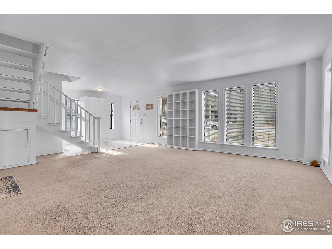 1628 4th Street Boulder, CO 80302 - Photo 6 of 27 a view of an empty room with a window
