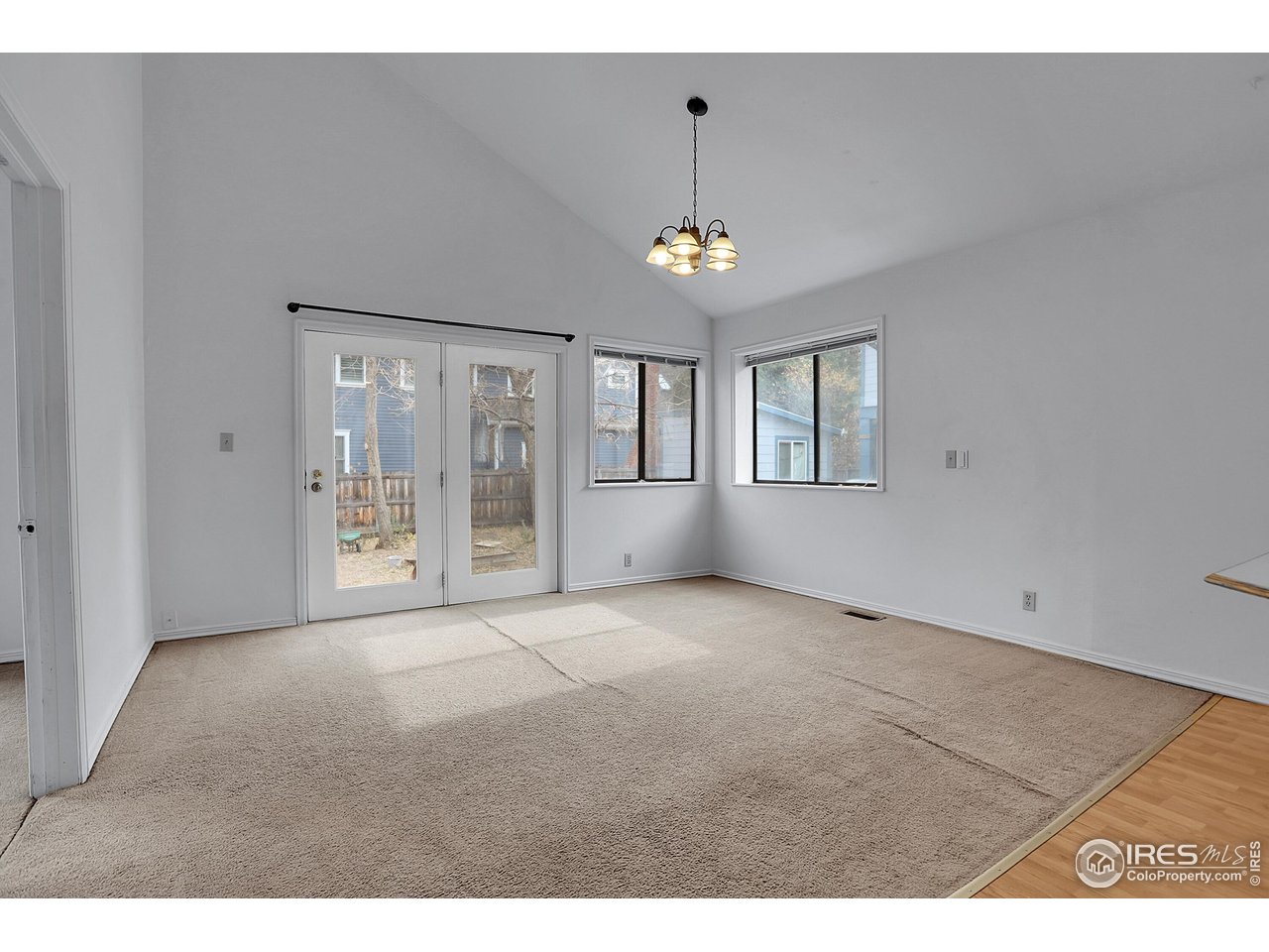 1628 4th Street Boulder, CO 80302 - Photo 10 of 27 a view of an empty room with a window