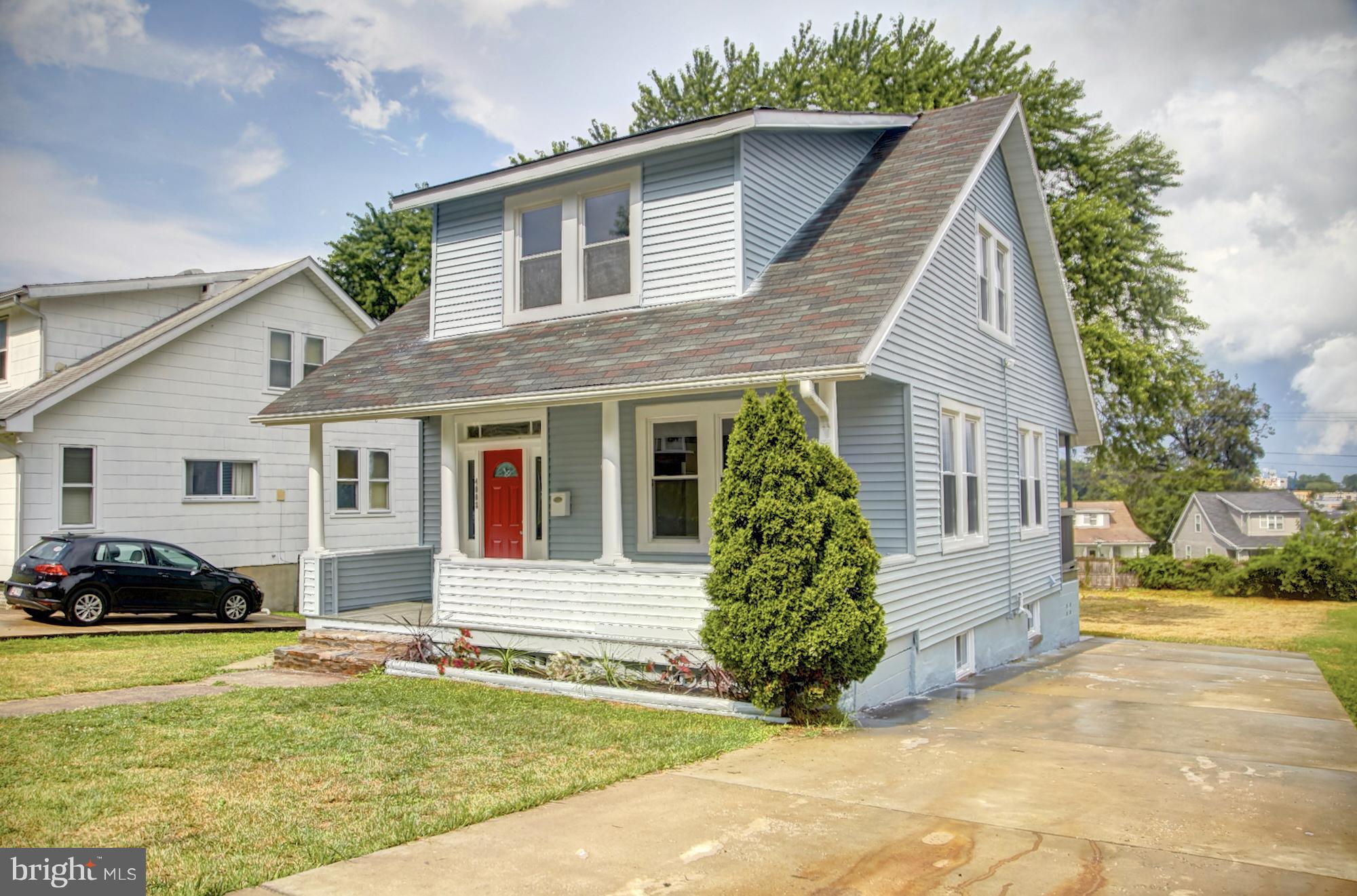 4008 Ridgecroft Road Baltimore, MD 21206 - Photo 2 of 17 a house view with a garden space