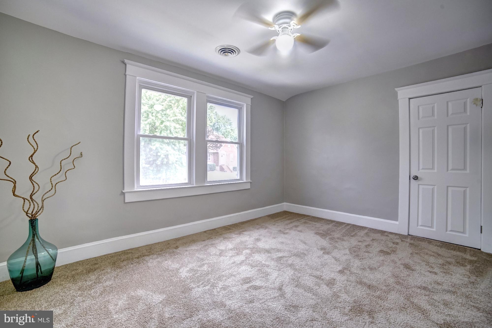 4008 Ridgecroft Road Baltimore, MD 21206 - Photo 14 of 17 a view of an empty room with a window