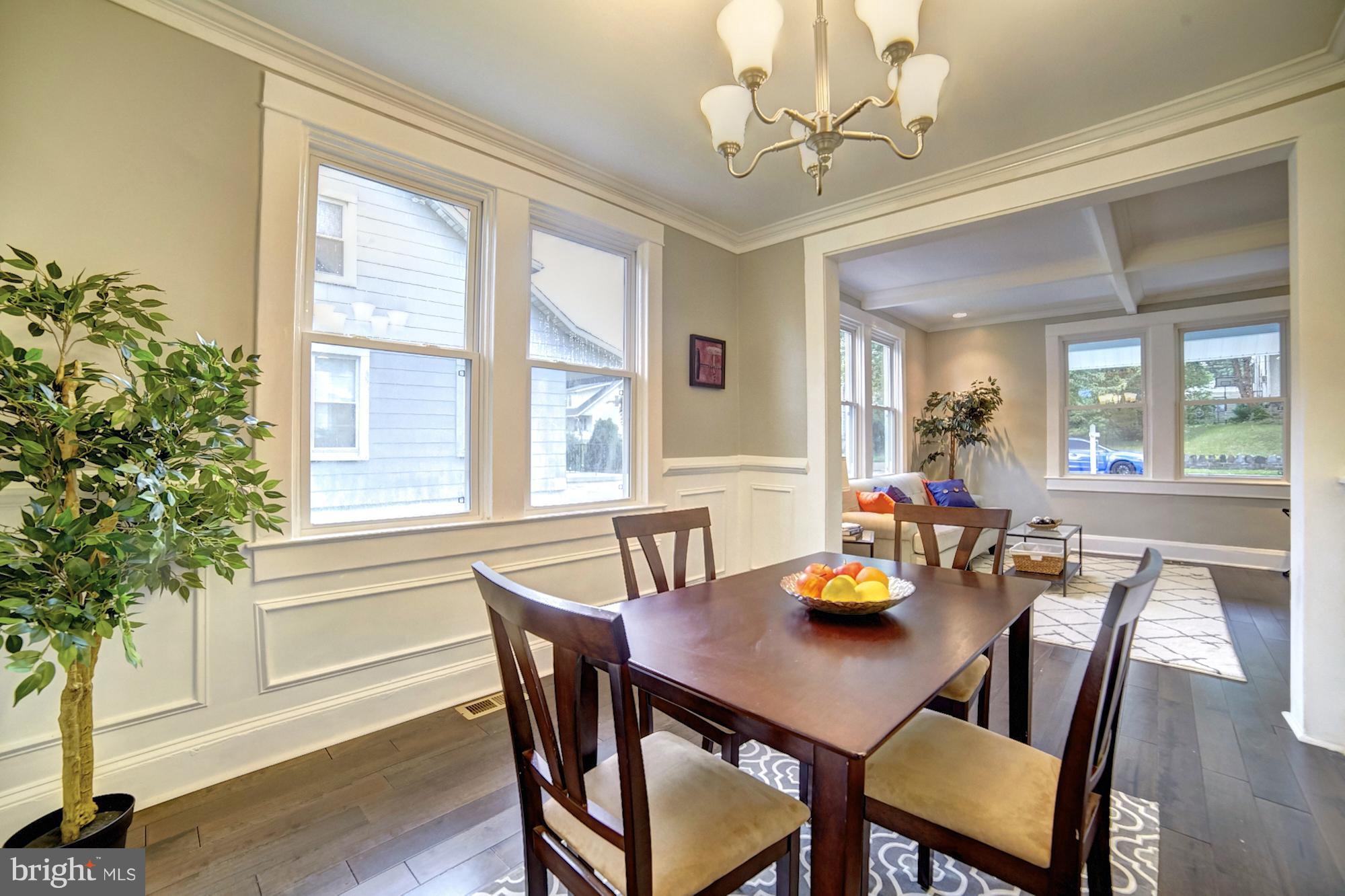 4008 Ridgecroft Road Baltimore, MD 21206 - Photo 8 of 17 a view of a dining room with furniture window and wooden floor