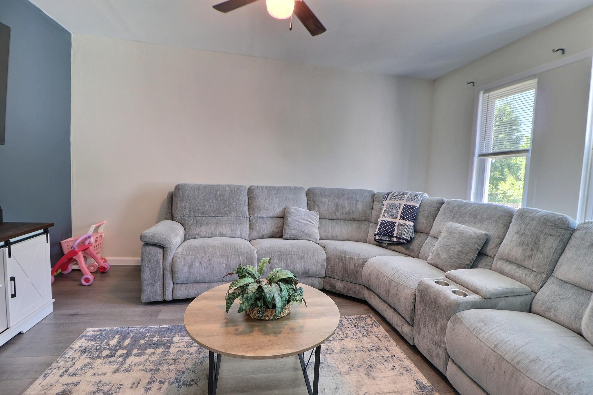 1022 Penn Line Road Paulsboro, NJ 08066 - Photo 8 of 19 a living room with furniture and a large window