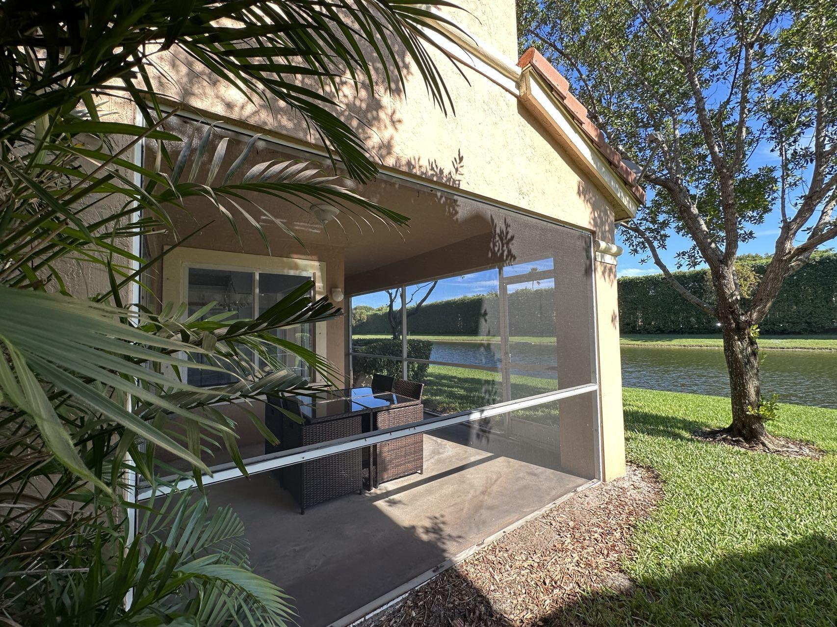 5202 Crossing Rocks Court Riviera Beach, FL 33407 - Photo 2 of 3 patio view