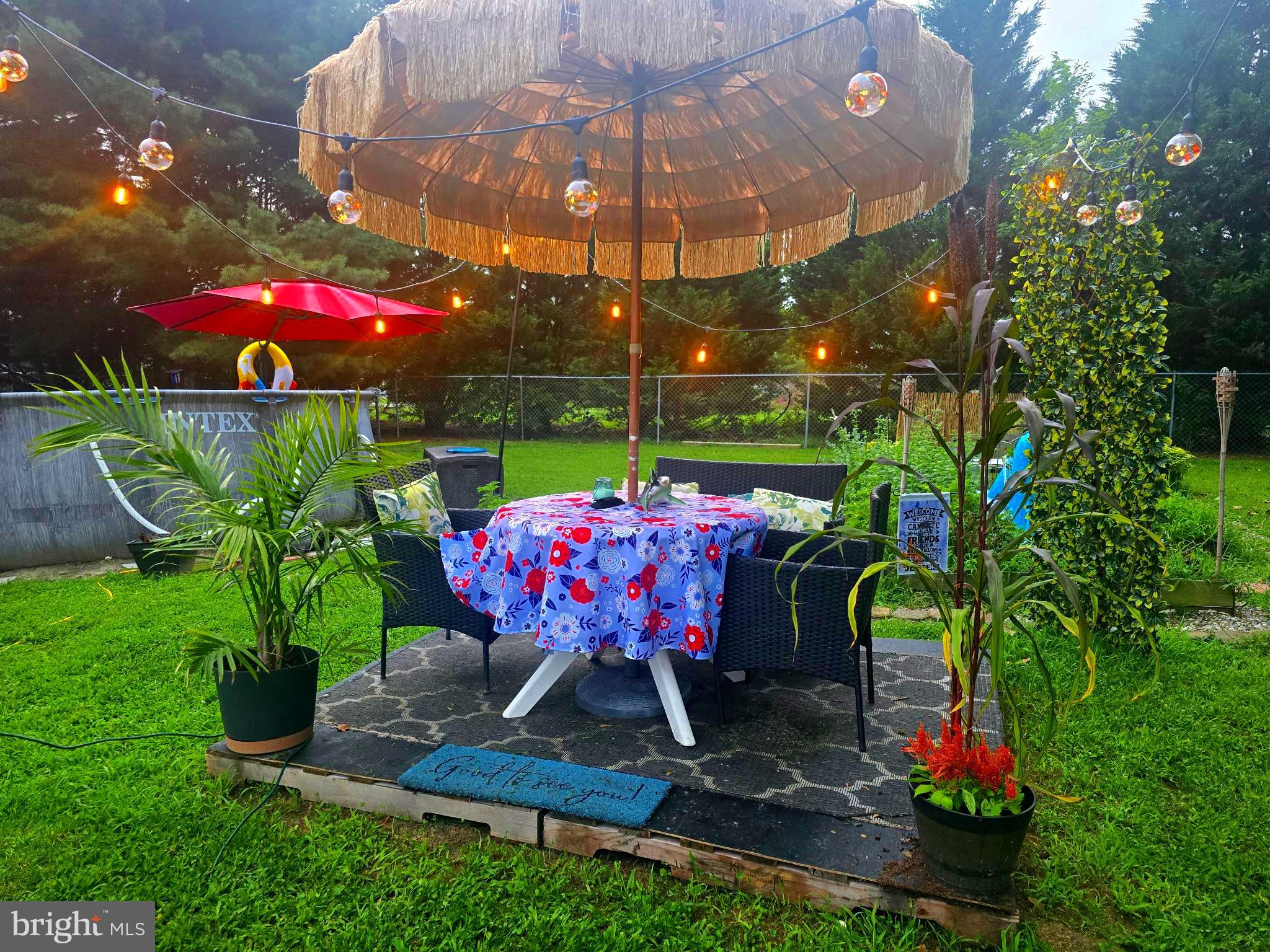 18178 Progress School Road Bridgeville, DE 19933 - Photo 30 of 49 Charming outdoor oasis with vibrant decor.