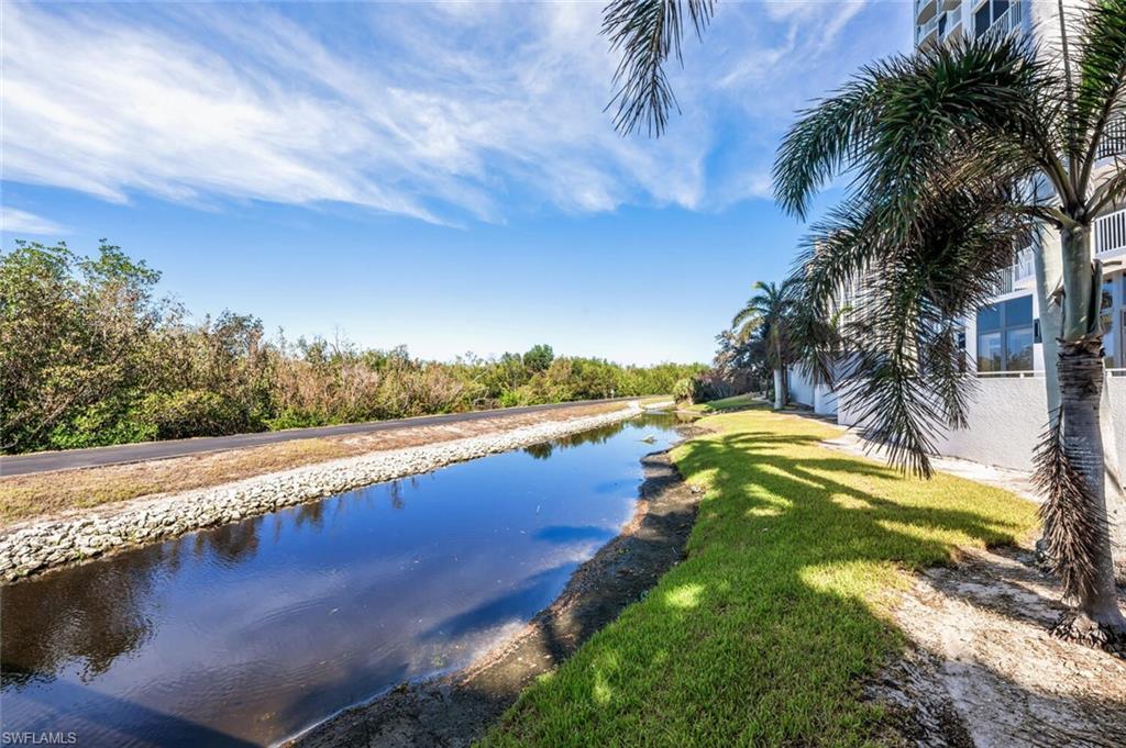 6849 Grenadier Boulevard, Unit 503 Naples, FL 34108 - Photo 41 of 50 a view of an ocean and beach