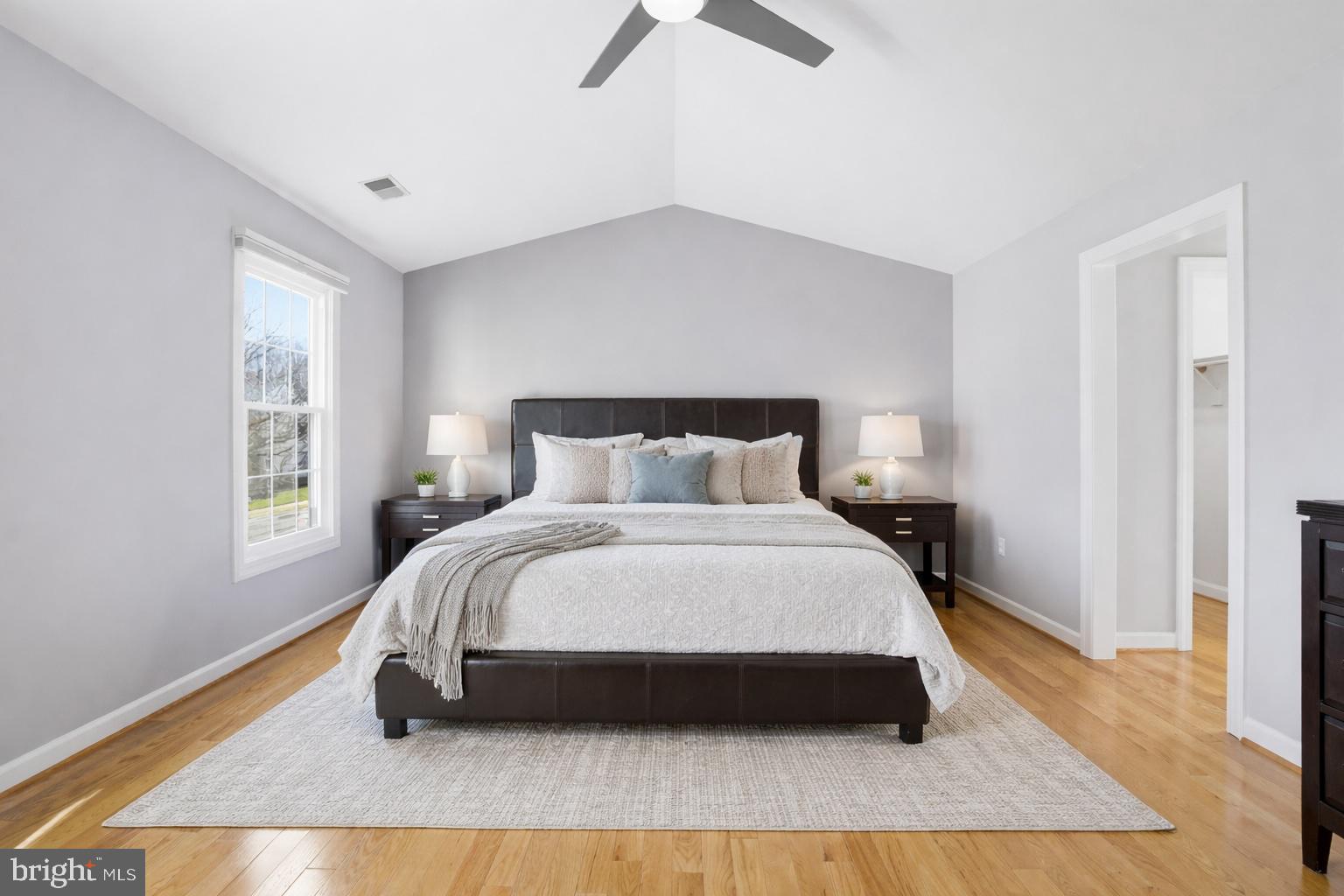 13222 Maplecrest Drive Potomac, MD 20854 - Photo 21 of 61 a bedroom with a bed and a window