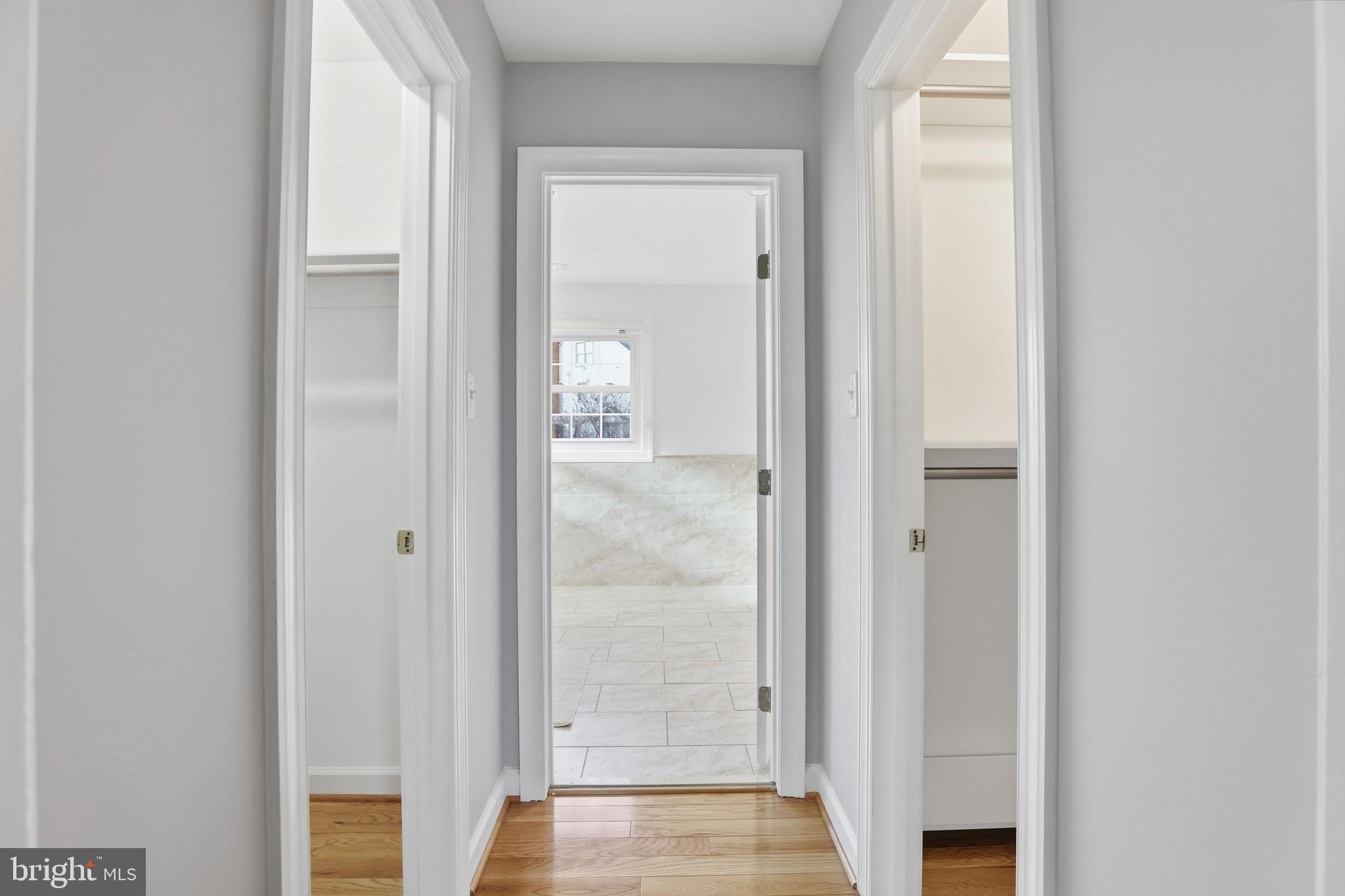 13222 Maplecrest Drive Potomac, MD 20854 - Photo 25 of 61 a view of a bathroom from a hallway