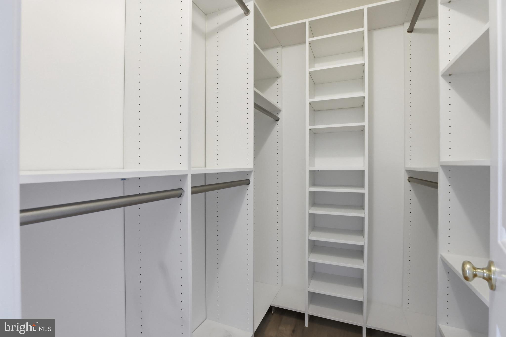 13222 Maplecrest Drive Potomac, MD 20854 - Photo 26 of 61 a view of walk in closet with empty racks