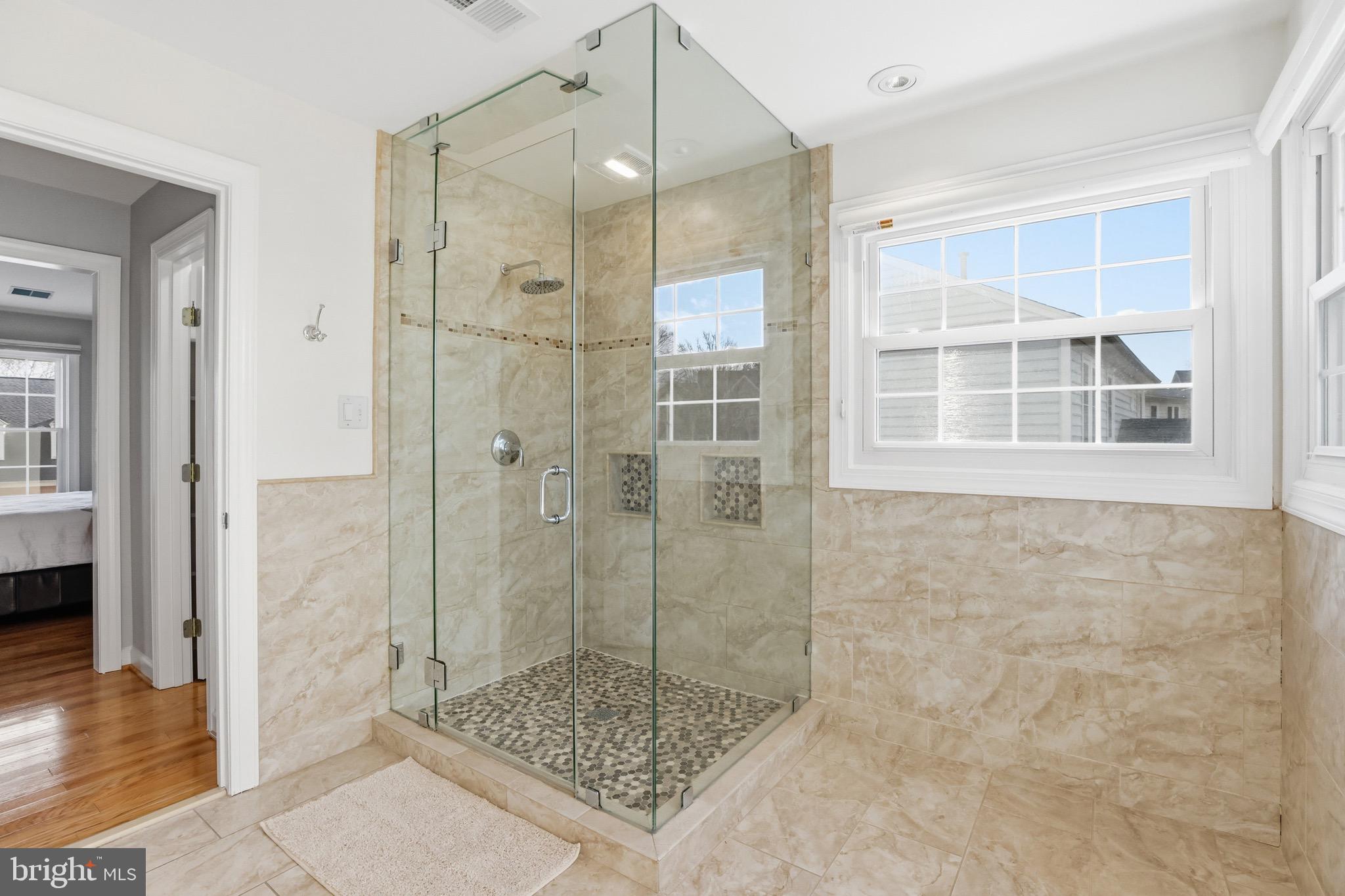 13222 Maplecrest Drive Potomac, MD 20854 - Photo 29 of 61 a bathroom with a shower and a sink