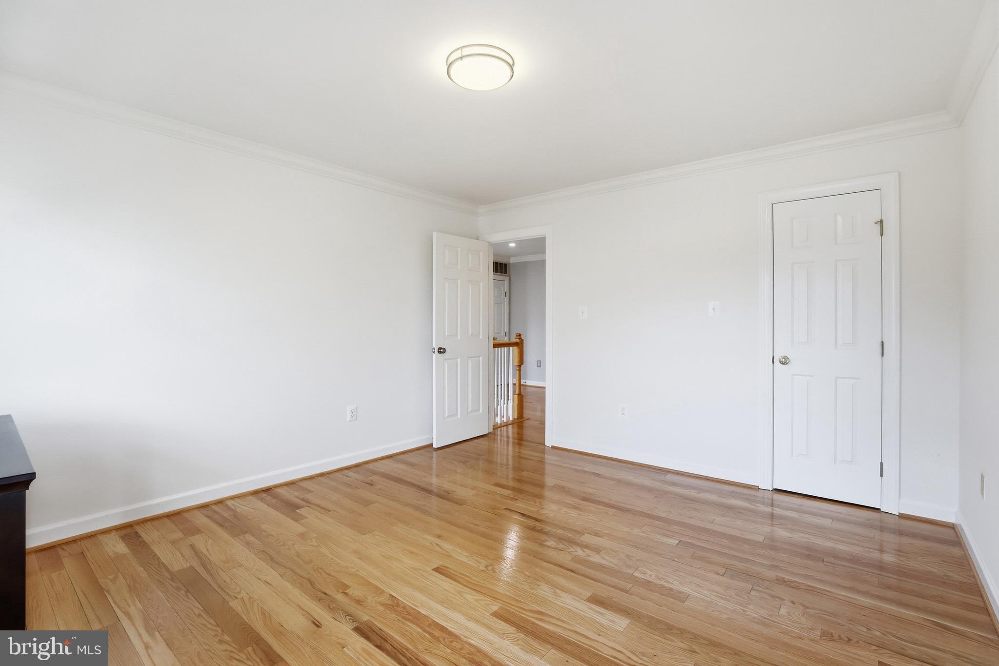 13222 Maplecrest Drive Potomac, MD 20854 - Photo 39 of 61 wooden floor in an empty room