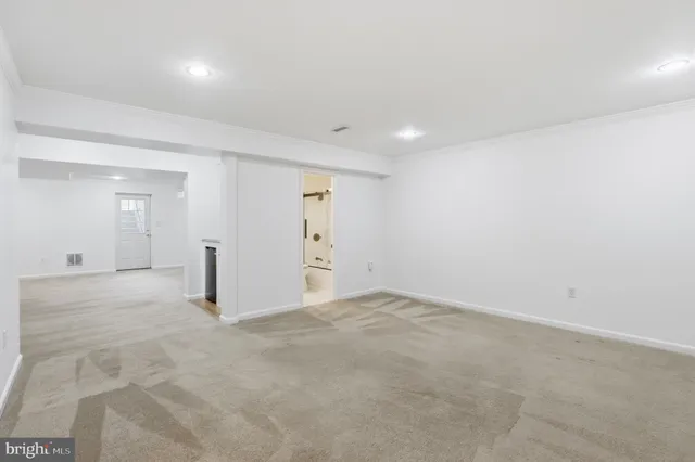a outdoor living space with patio furniture and a potted plant