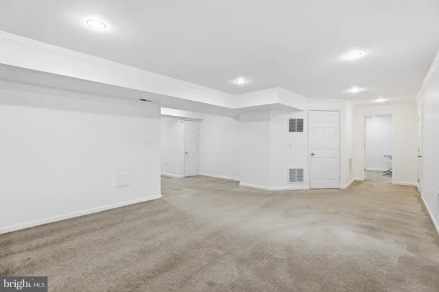 a picture of a wall with a white wall and a picture