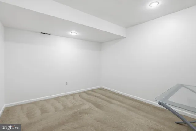 a view of an entryway with a livingroom