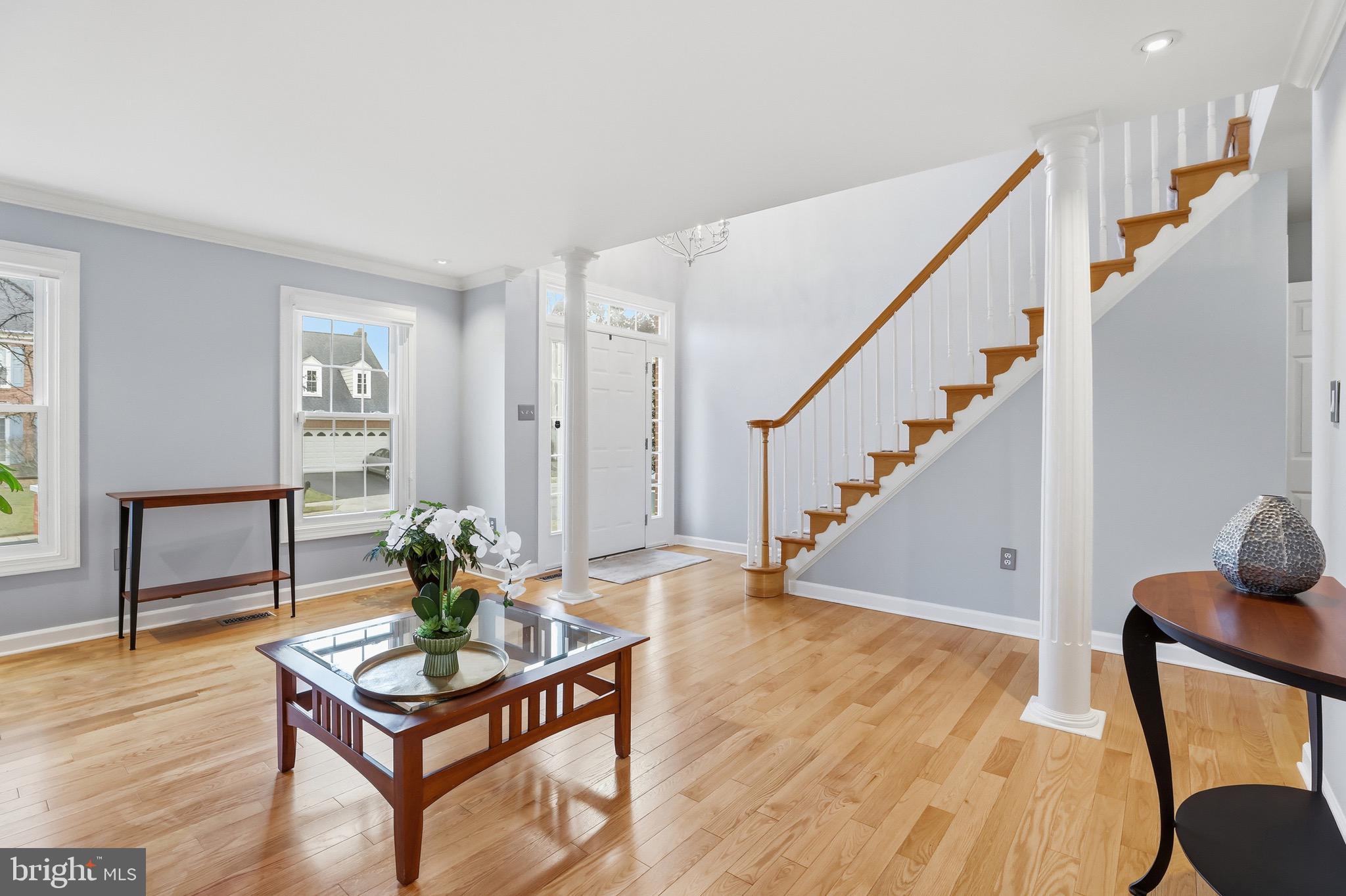 13222 Maplecrest Drive Potomac, MD 20854 - Photo 5 of 61 a living room with furniture and a wooden floor