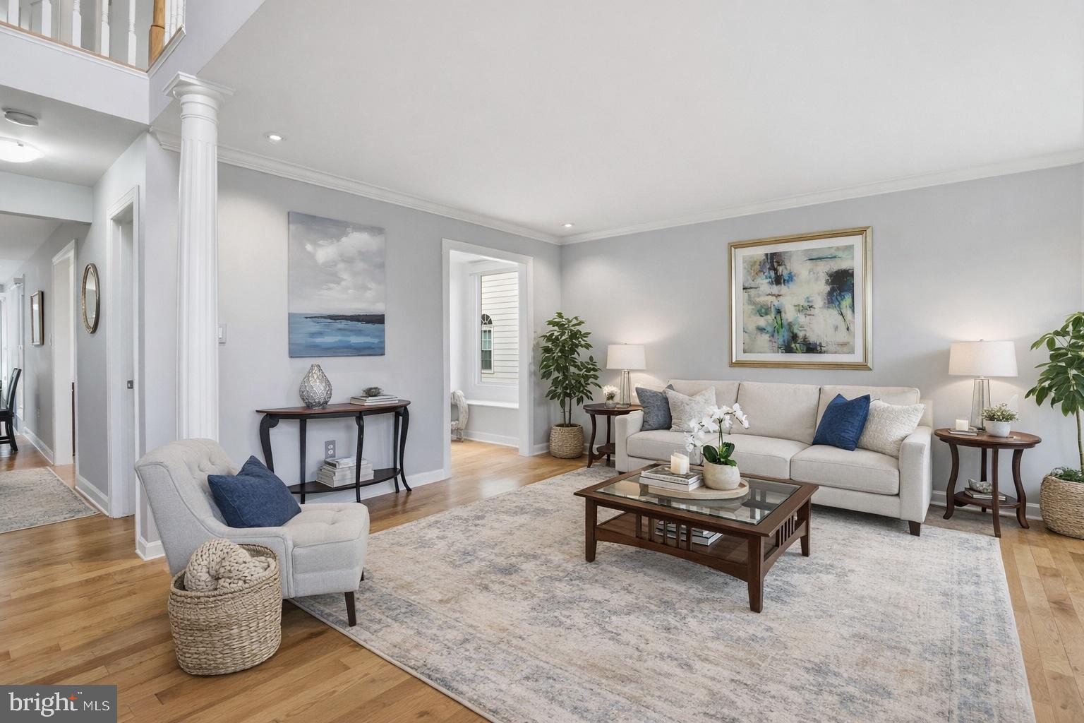 13222 Maplecrest Drive Potomac, MD 20854 - Photo 6 of 61 a living room with furniture and wooden floor