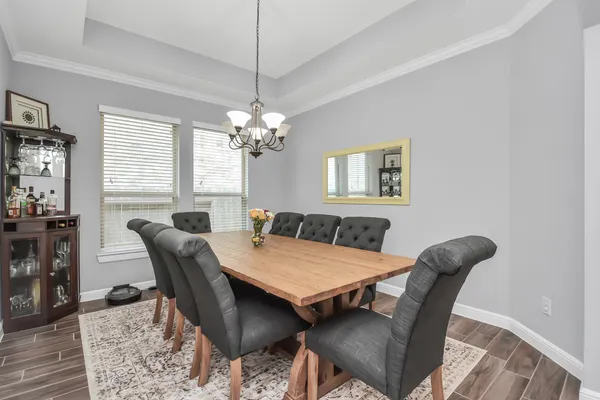a view of a dining room with furniture
