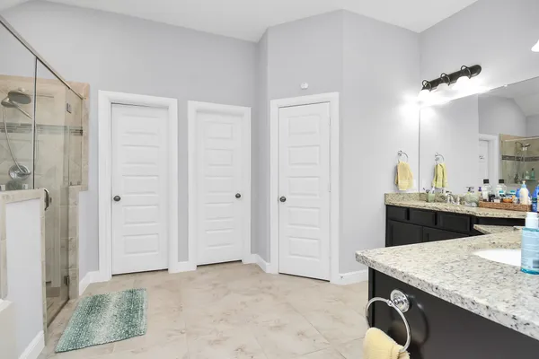 a kitchen with a sink and cabinets