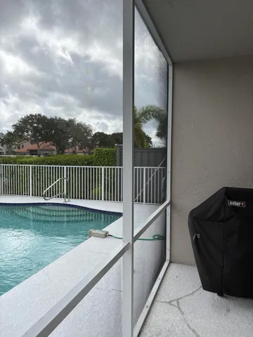 a view of deck with a fence